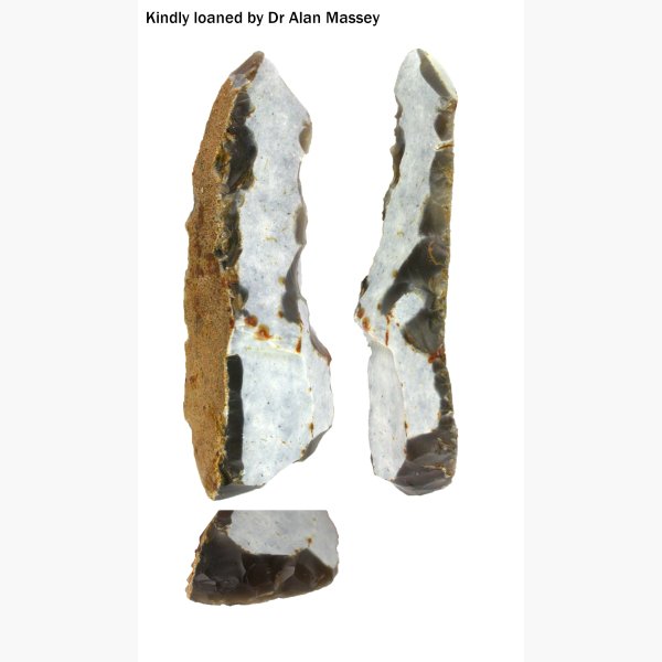 Photograph of a Palaeolithic Flint Blade with later re-working in three pieces.